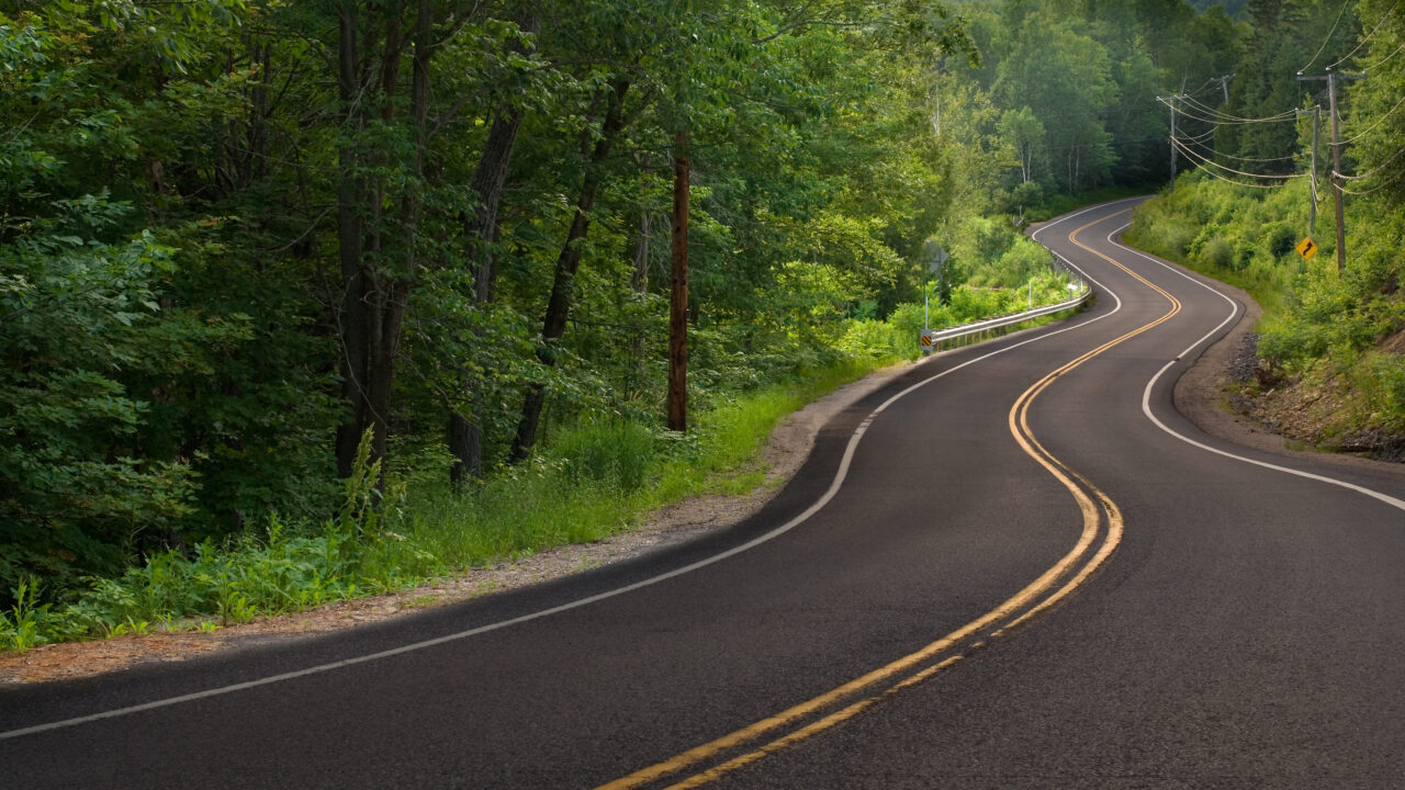 Travelling on a curved road in the mountains