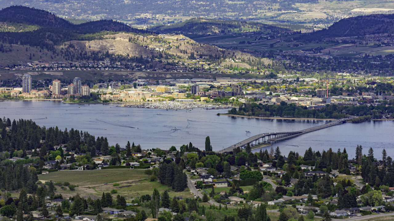 A view of the Kelowna Skyline, Okanagan Lake and the William R Bennett Bridge from Mount Boucherie in West Kelowna British Columbia Canada in the summer